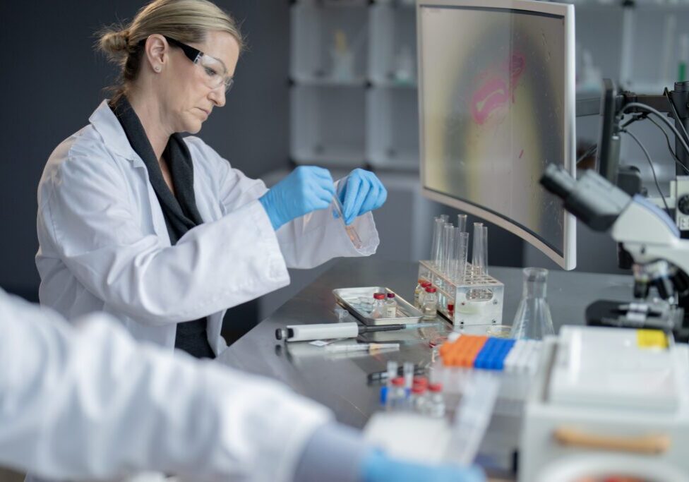 Woman conducting scientific experiment